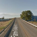 Belton Dam Mural Now via Google Maps shows a long road stretched out.