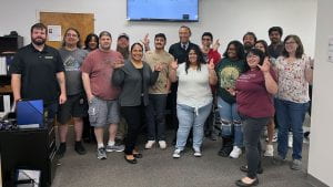The ITAC Call Center team welcomes TXST President Kelly Damphousse during his recent site visit.